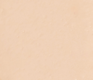 Close-up texture of Brow Sculpting Creme Refill in light shade, showcasing smooth and creamy consistency for shaping brows.
