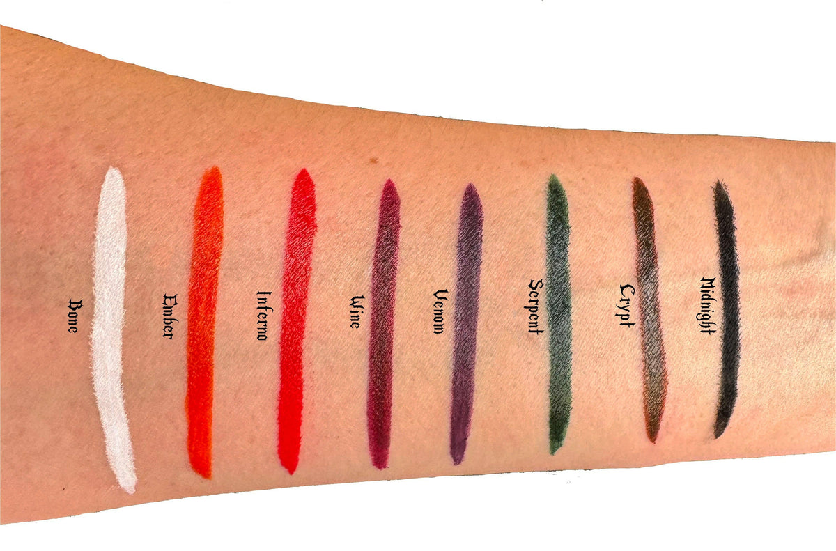 Swatches of Midnight and other colorful eyeliner shades on skin, demonstrating waterproof and smudge-proof precision.