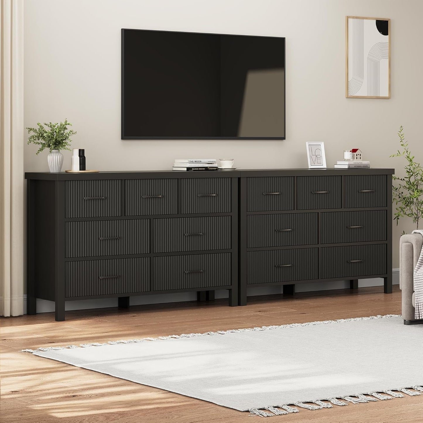 Fluted Contemporary White Dresser With Black Handles in a modern living room setting.
