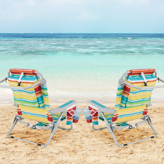 Foldable Backpack Beach Chair with Cup Holder and Storage Pockets Set of 2-Multicolor on a sandy beach with ocean view