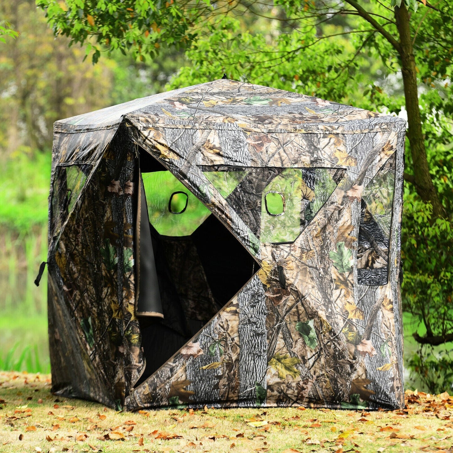 3 Person Portable Pop-Up Ground Tent with Gun Ports and Carrying Bag in camo design for hunting outdoors.