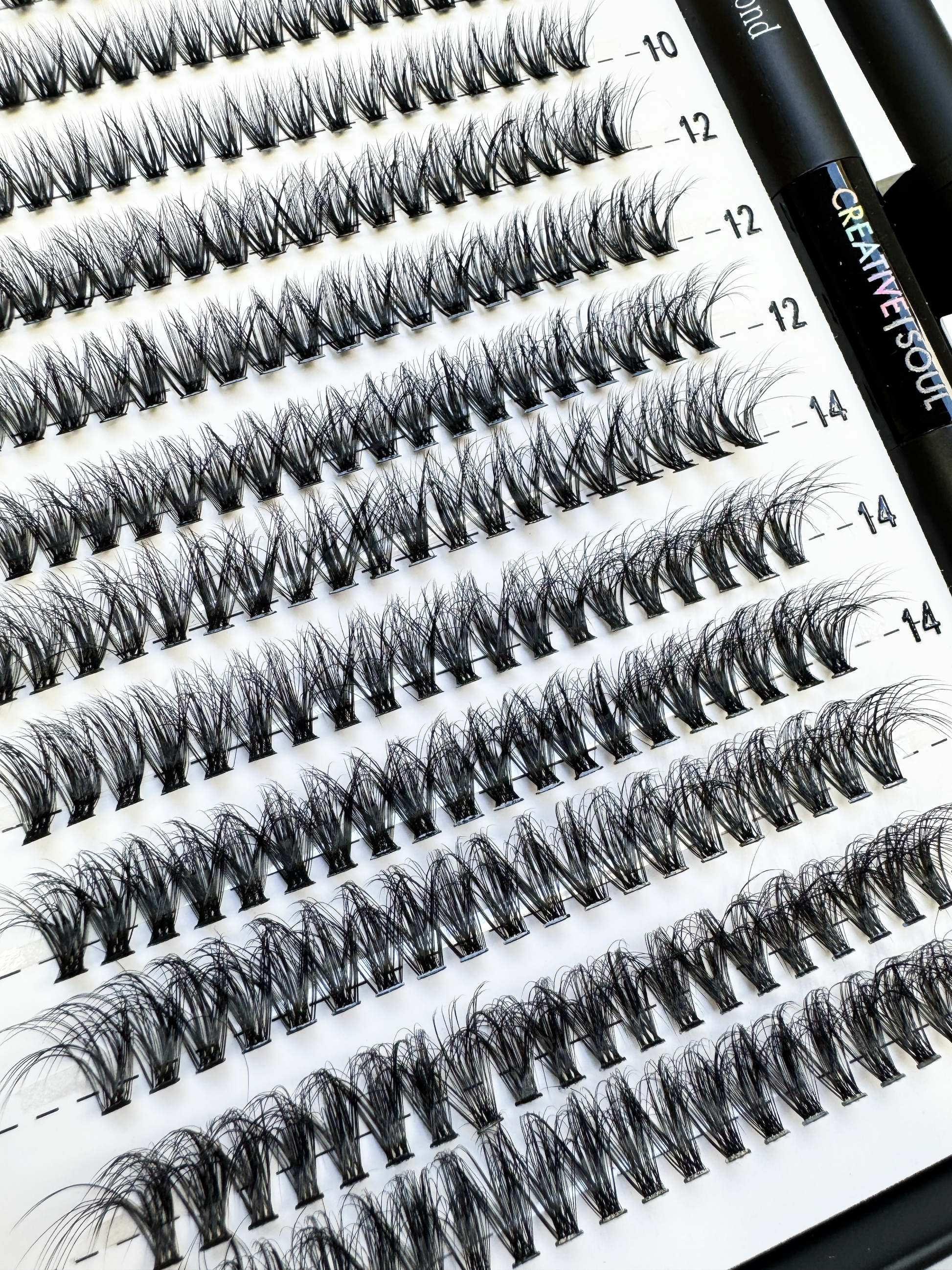 Illusion DIY Eyelash Extension Kit with faux mink clusters in various sizes, perfect for professional home lash extensions