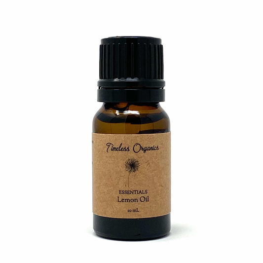 Bottle of Timeless Organics Lemon Essential Oil, 10 mL, pure, organic and undiluted, with citrusy and bright aroma for mood upliftment.