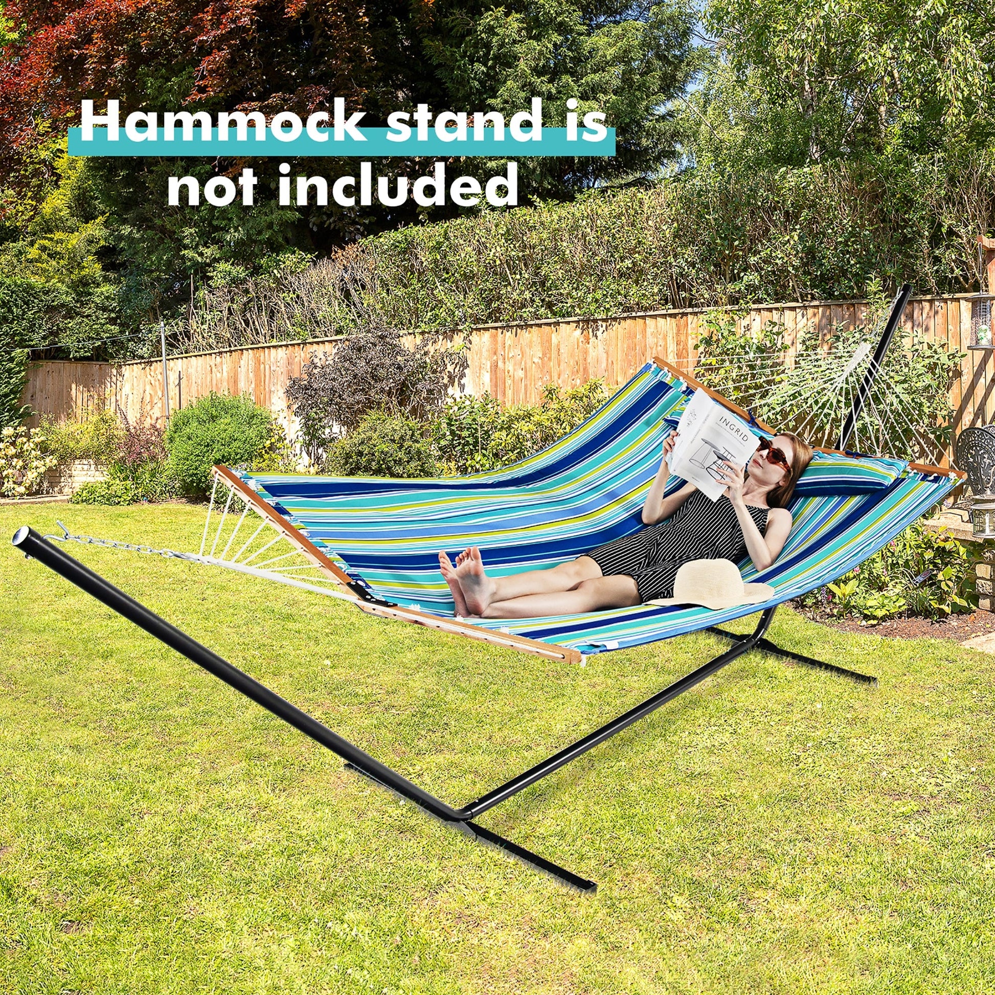 Person relaxing on Patio Hammock Foldable Portable Swing Chair Bed with Detachable Pillow outdoors, stand not included.