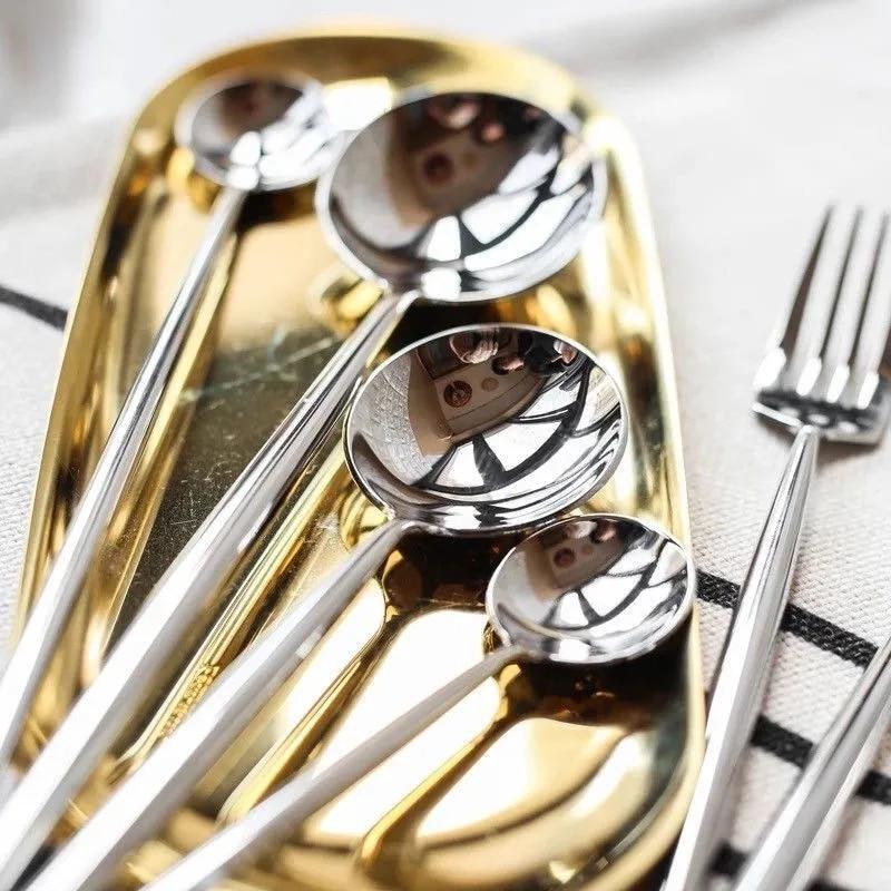 Stella 30-Piece Flatware Set featuring mirror-polished stainless steel with traditional Korean design on a gold tray.