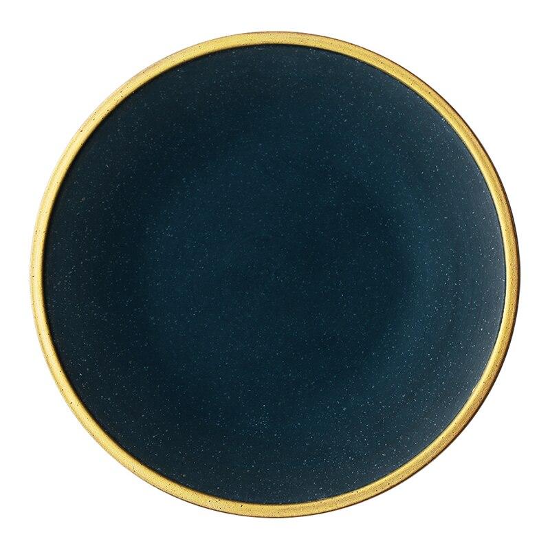 Galileo Tableware porcelain plate with matte green glaze and golden ring, handcrafted for elegance, dishwasher and freezer safe.