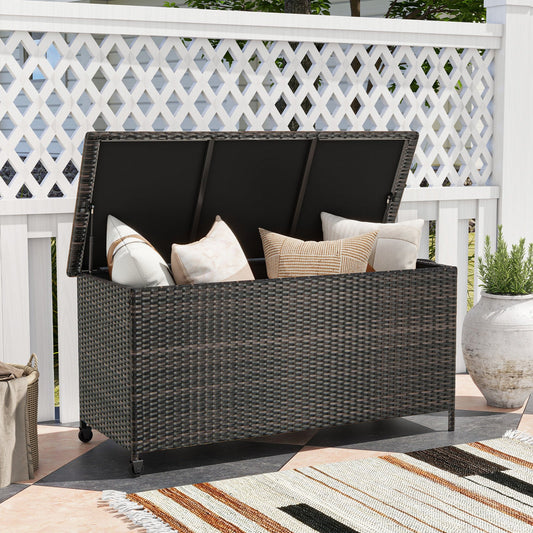 Indoor Outdoor 85 Gallon Storage Container with Waterproof Liner and Universal Wheels-Brown on patio with cushions inside