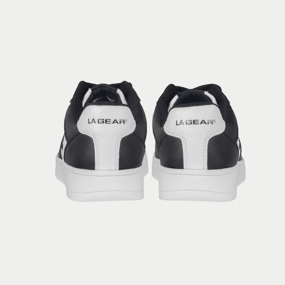 Rear view of LA Gear Kids Edge Lowtop | Black x White Logo sneakers for children, featuring classic 90s street style.