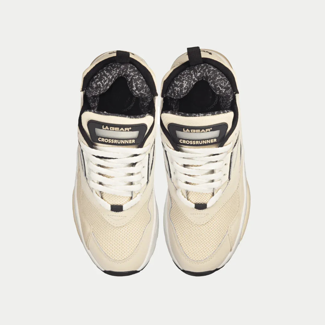 Top view of LA Gear Men's Turbo Light-Up Mid in Off-White x Black, showcasing 90s style and genuine leather with mesh paneling.