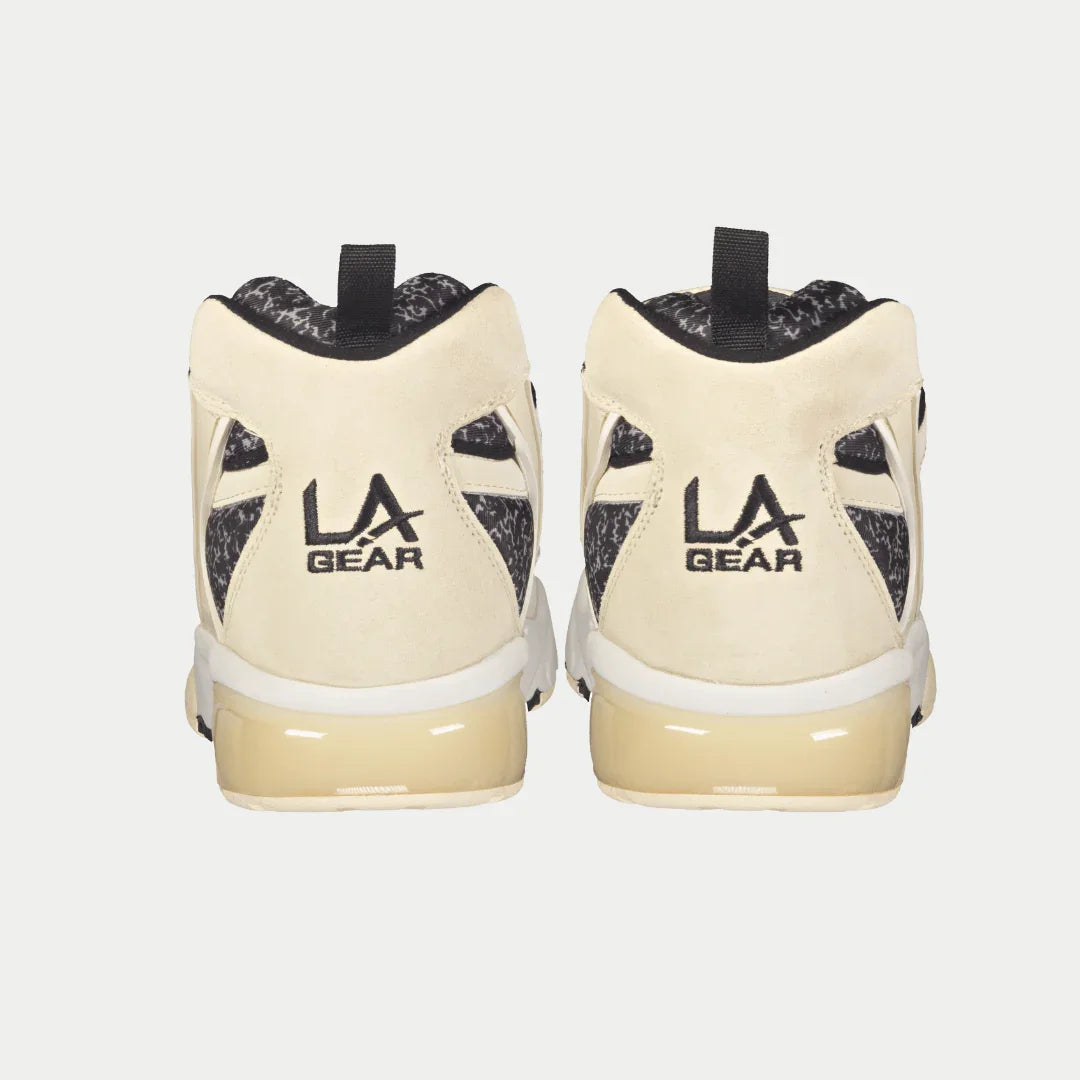 Back view of LA Gear Men's Turbo Light-Up Mid | Off-White x Black sneaker showcasing light-up detail and bold design.