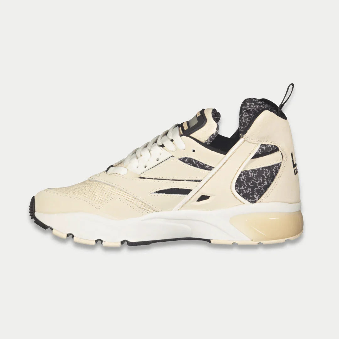 LA Gear Men's Turbo Light-Up Mid | Off-White x Black sneaker side view with genuine leather and mesh paneling.