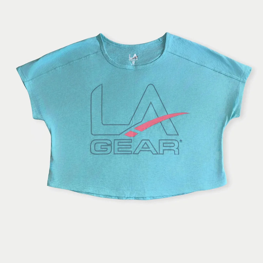 LA Gear Women’s Cropped Tee in Light Aqua with Slate x Pink Logo featuring short capped sleeves and a wide neckline
