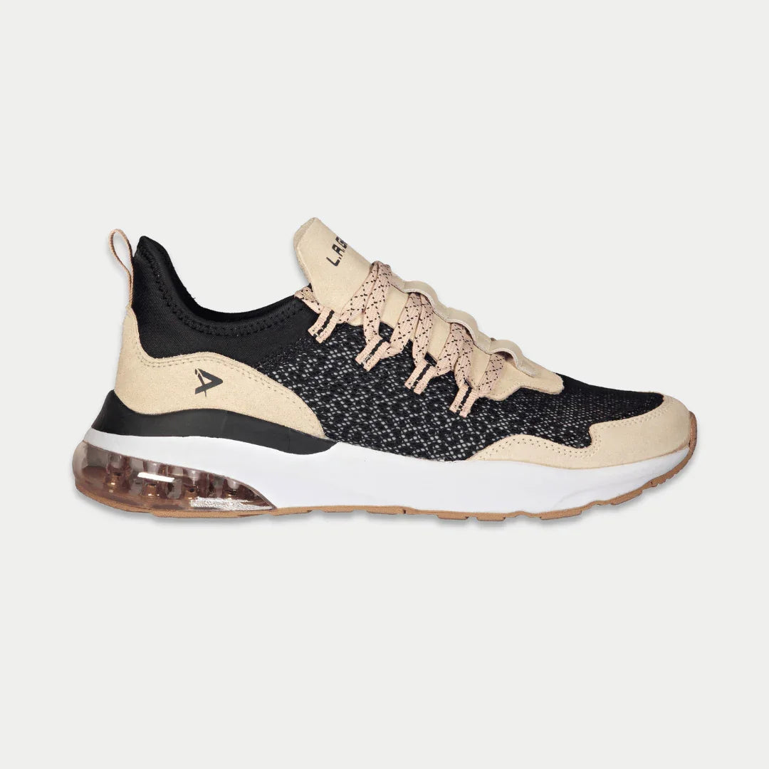 LA Gear Women’s Runyon Lowtop | Black x Pink sneaker featuring mesh and suede design with cushioned gel outsole for comfort.