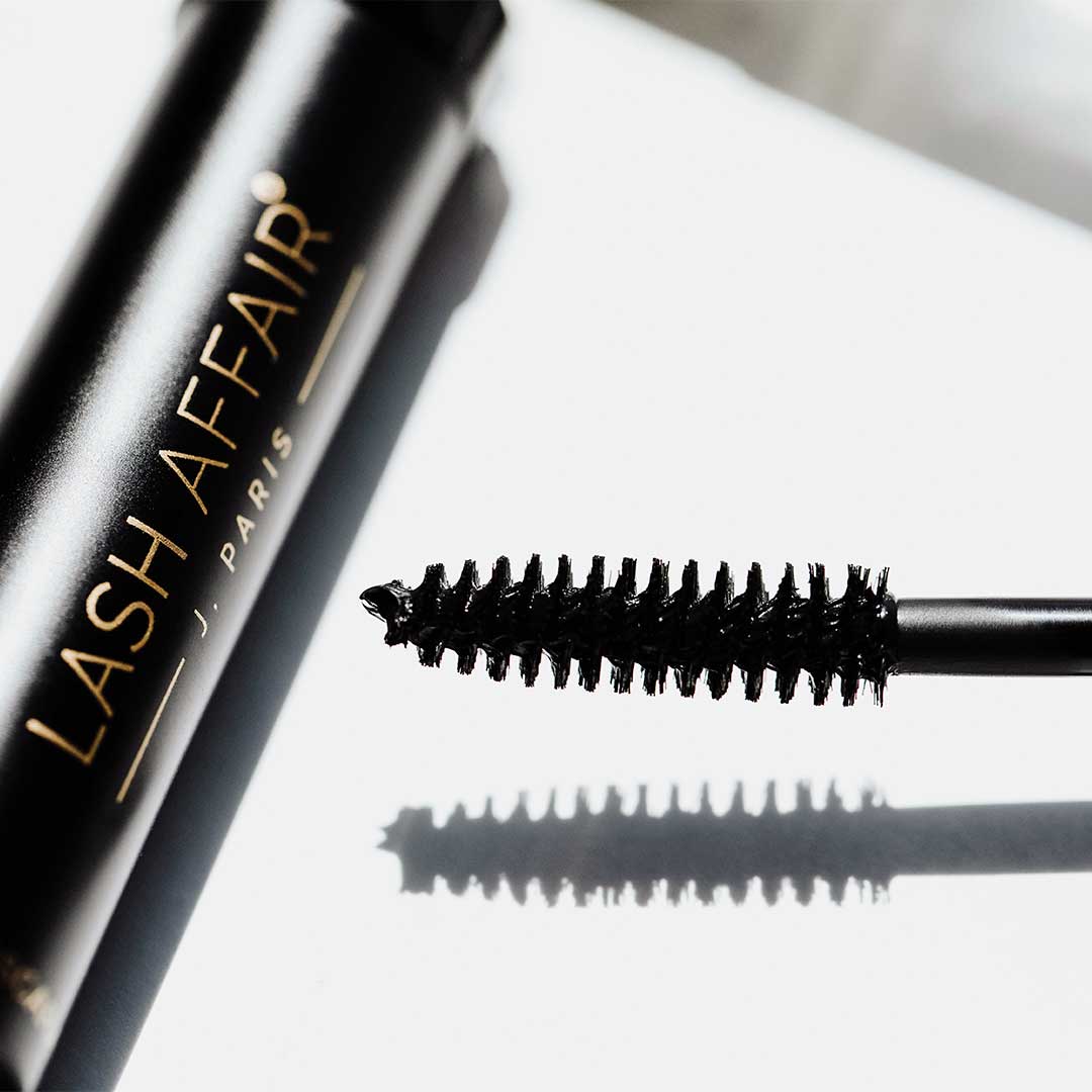 Close-up of mascara brush and tube for The Good Ex | Eyelash Extension Safe Mascara, highlighting its creamy texture and pigmentation.