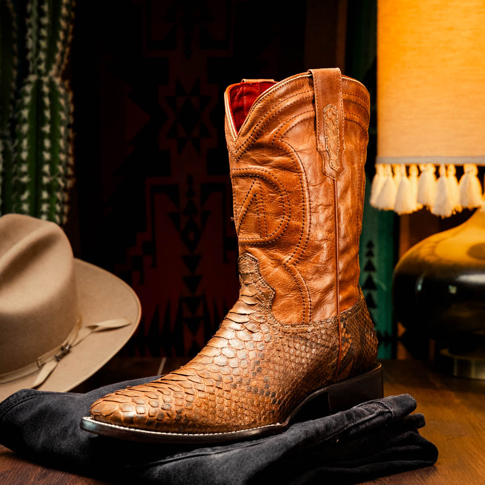 Missouri Cognac Python Skin Cowboy Boot, handcrafted Western footwear with exotic Python design and square toe, displayed stylishly.
