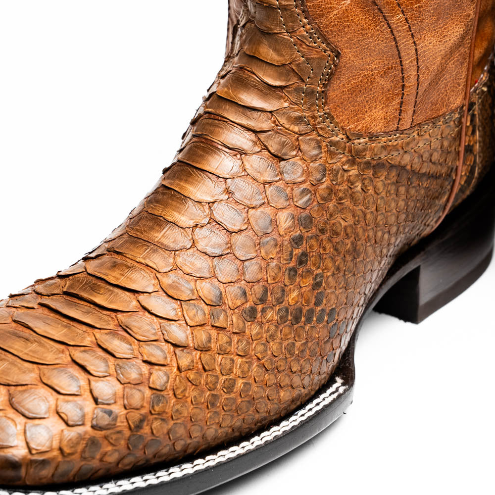 Close-up of Missouri Cognac cowboy boot with genuine Python skin from the Western Collection, featuring a bold square toe design.