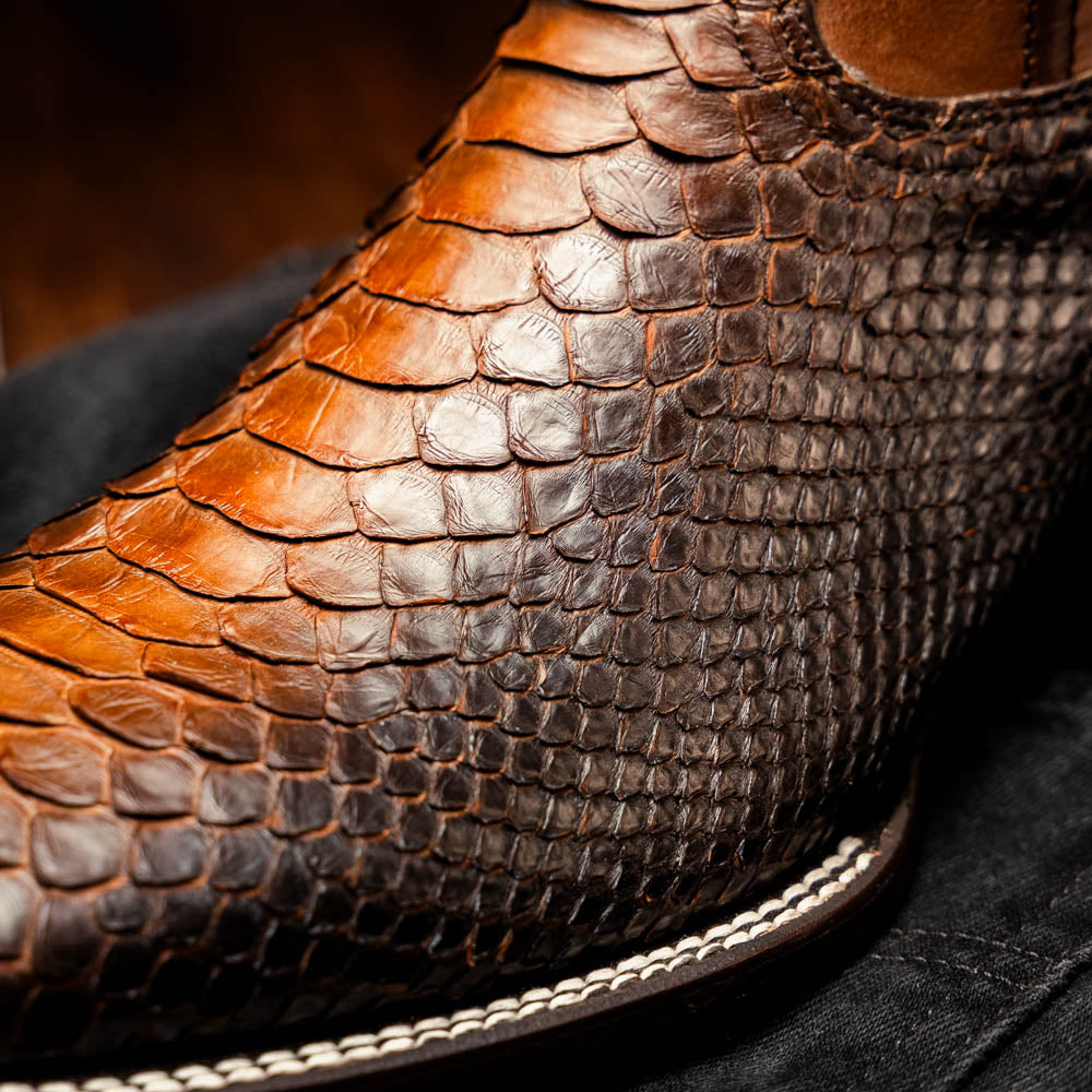 Close-up of Missouri Lisboa Python skin cowboy boot, showcasing exotic texture and craftsmanship.