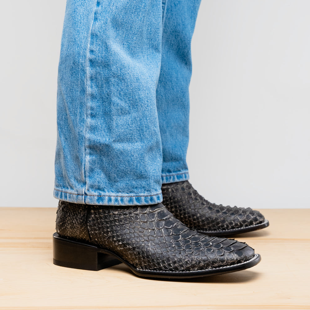 Missouri Stone White genuine Python skin cowboy boot with square toe design from the Western Collection, shown worn with jeans.