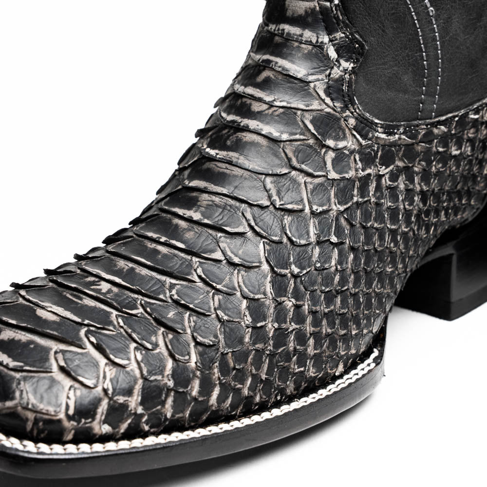 Close-up of Missouri Stone White genuine python skin cowboy boot from the Western Collection, featuring bold design and master craftsmanship.