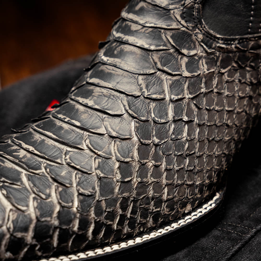 Missouri Stone White cowboy boot made of genuine Python skin showcasing rich texture and craftsmanship.