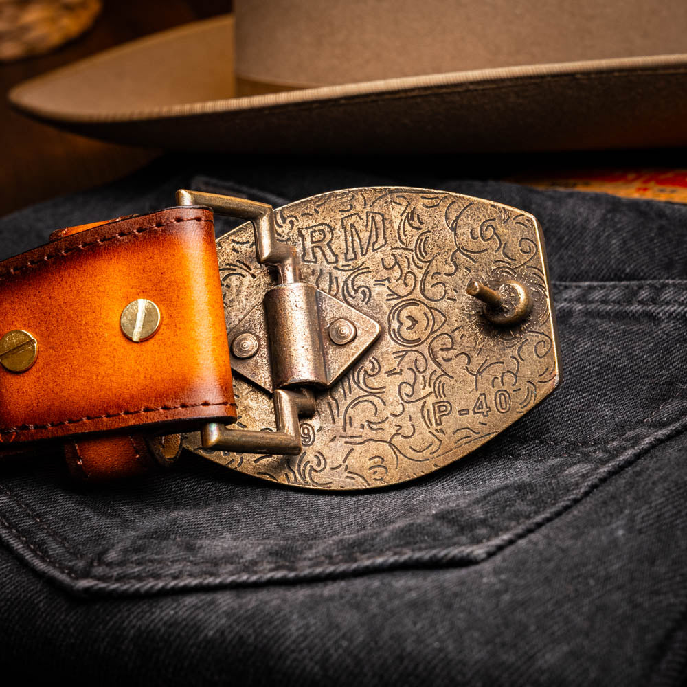 Montana Belt Aged Brown with intricate detail and handcrafted buckles showcasing rustic Western style.