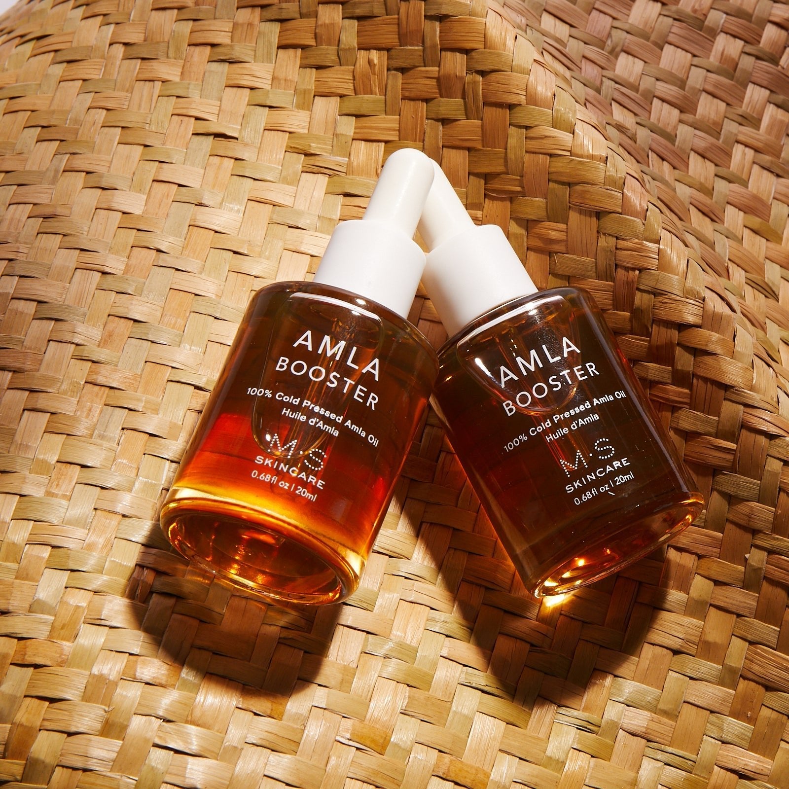 AMLA OIL: 100% cold pressed antioxidant booster oil for skincare and hair health, enhancing moisturizers with vitamin C and firming effects.