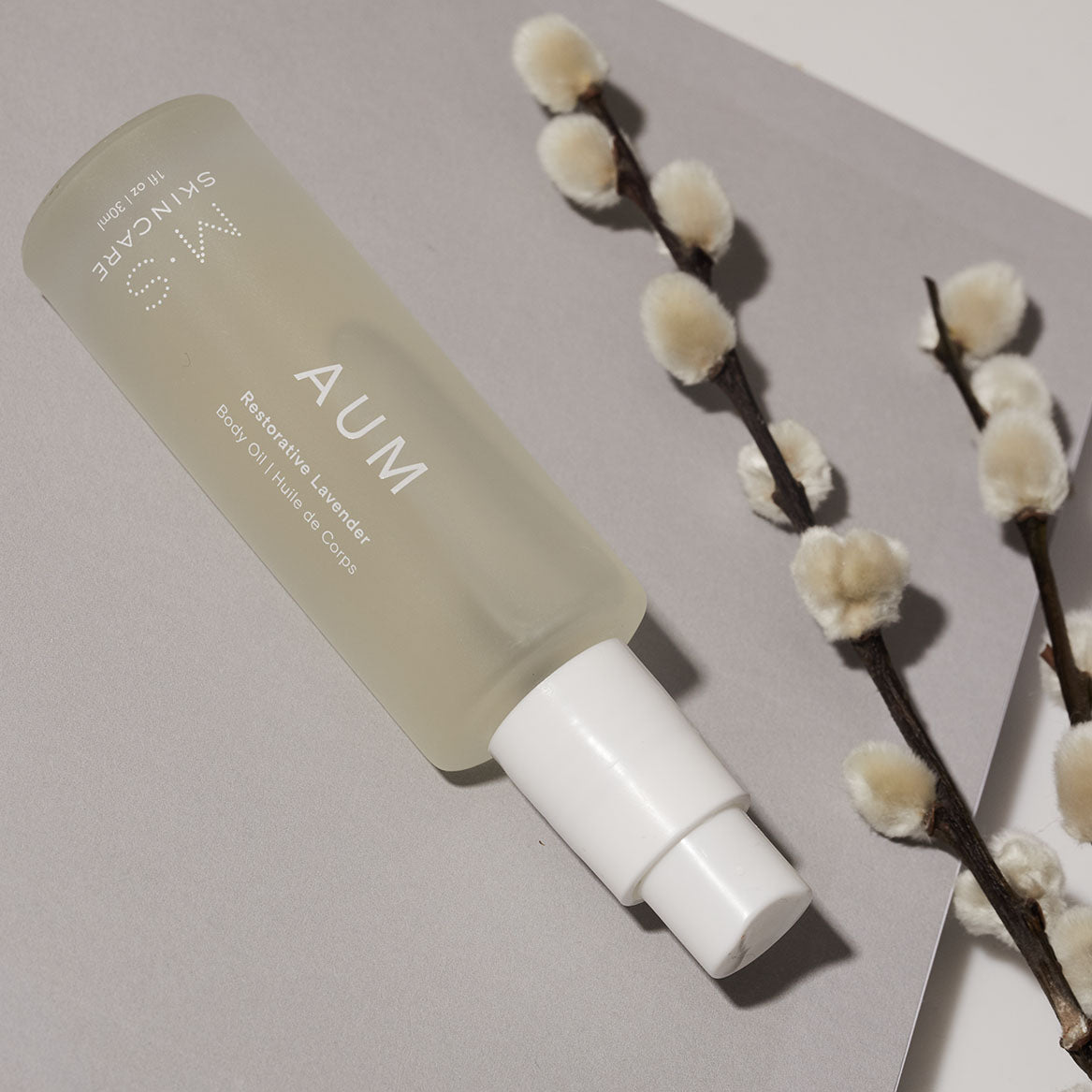 AUM Ayurvedic Lavender Body Oil with coconut and gotu kola extracts, promoting skin vitality and spiritual balance.