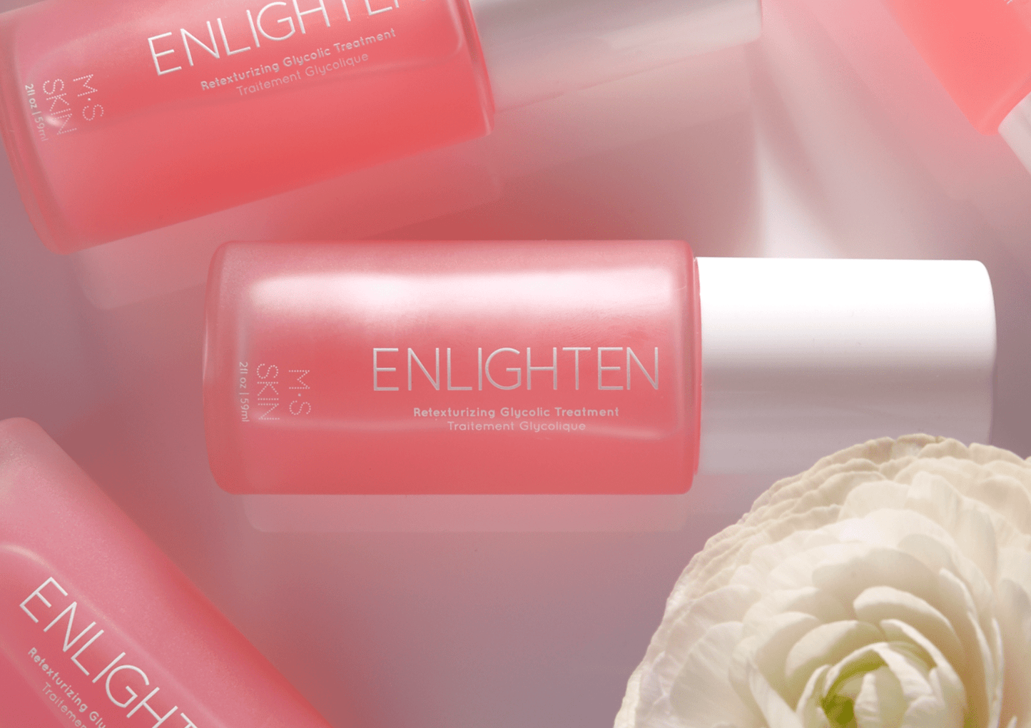 ENLIGHTEN retexturizing glycolic treatment with red seaweed and hibiscus for smoother, brighter skin, bottle view.