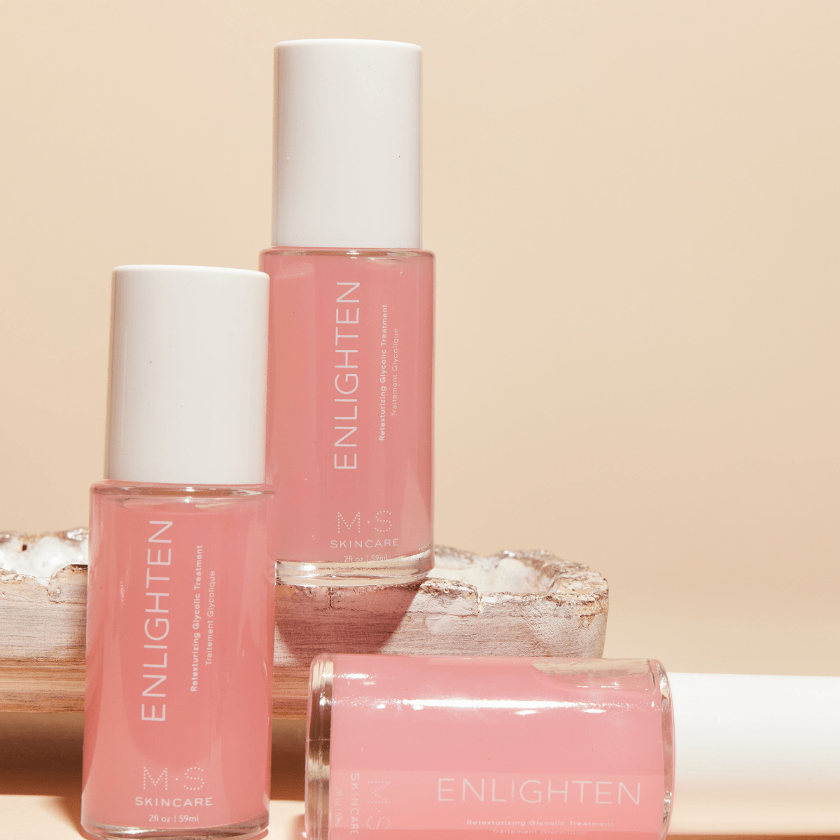 ENLIGHTEN re-texturizing treatment with glycolic acid, red seaweed, hibiscus for radiant skin, fade dark spots, and collagen support.