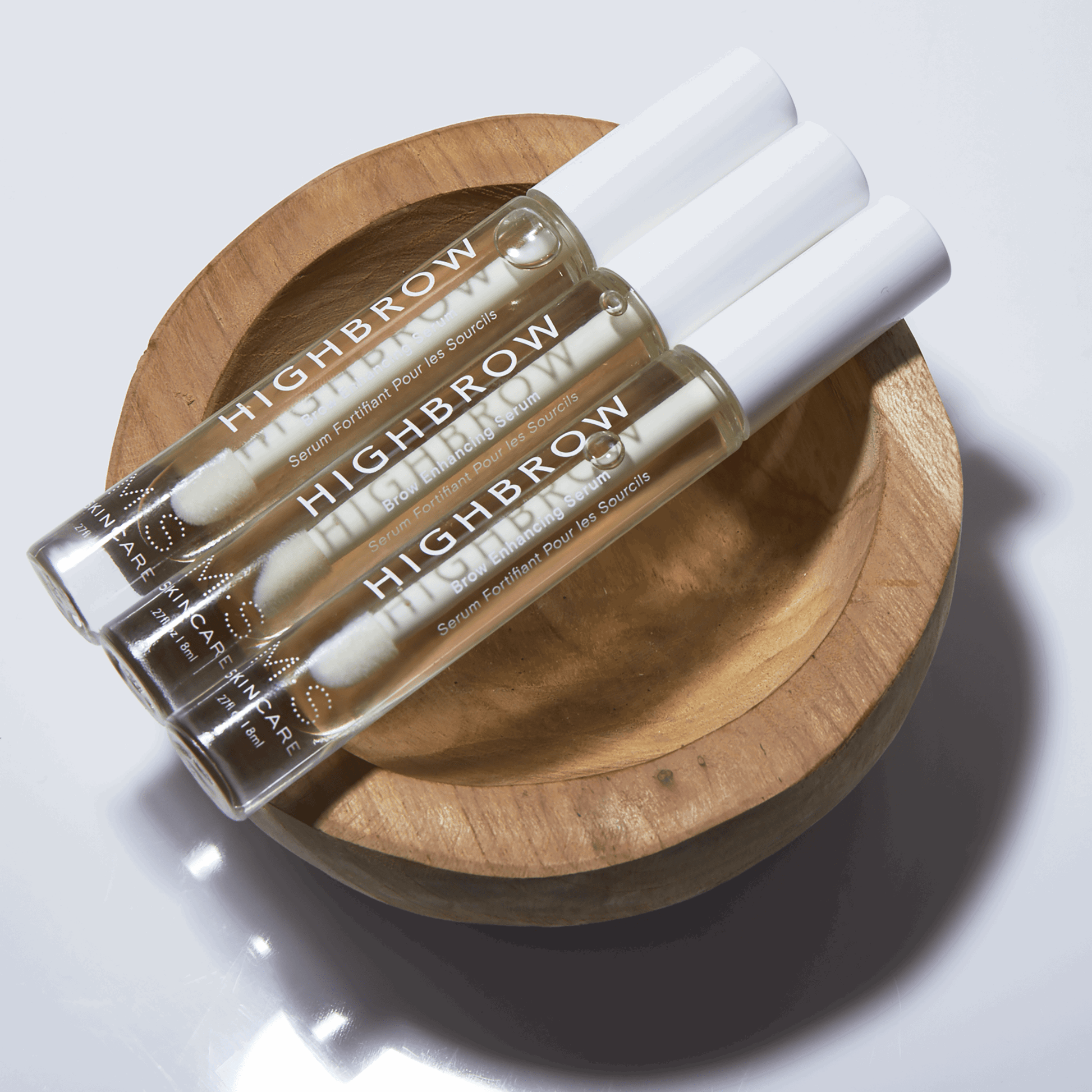 HIGHBROW eyebrow treatment oils in wooden bowl, luxurious nourishing overnight formula for thicker, fuller brows, paraben-free