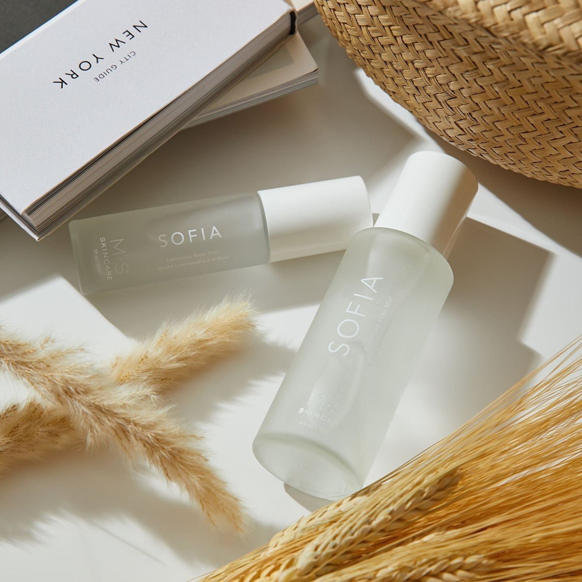 SOFIA botanical mist with antioxidant-rich rose base, 4 fl oz / 120 ml bottle, on a lifestyle display with natural accents.