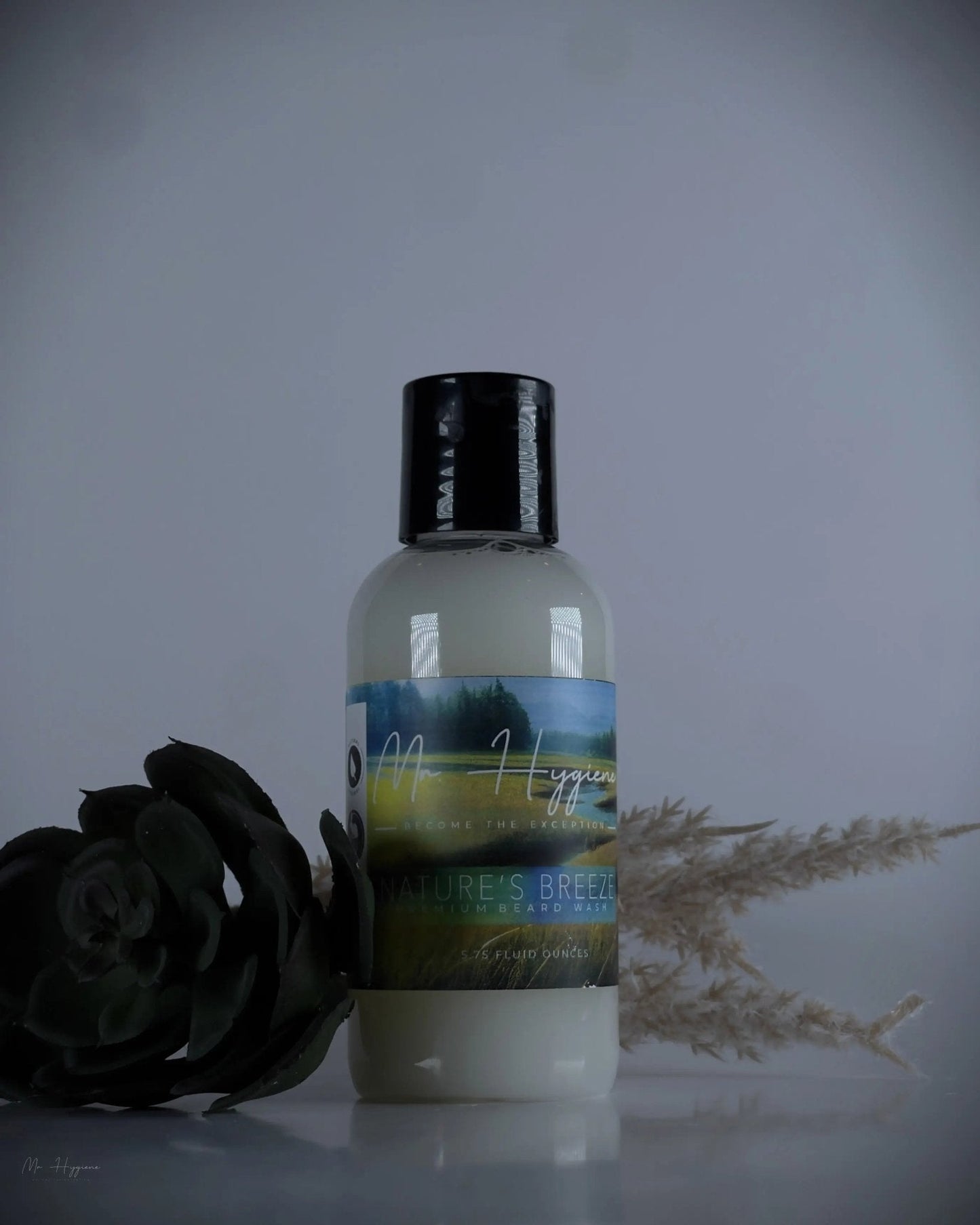 Nature's Breeze Organic Beard Wash bottle with natural elements background