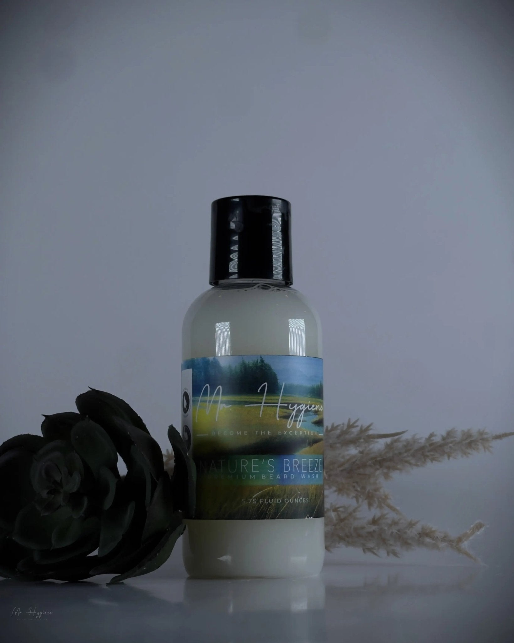 Nature's Breeze Organic Beard Wash bottle with natural elements background