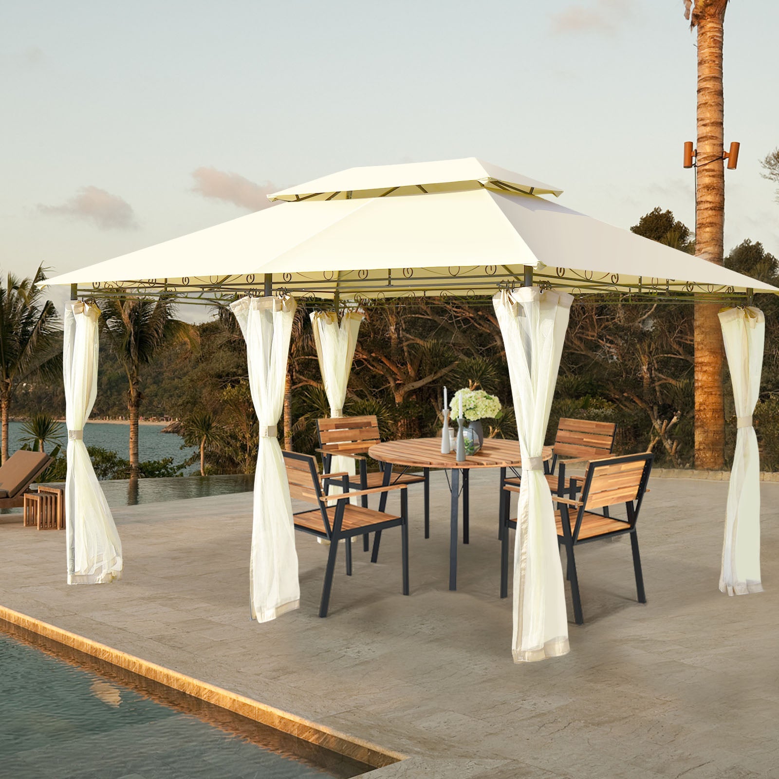 10 Feet x 13 Feet Tent Canopy Shelter with Removable Netting Sidewall-Beige by a poolside with chairs and table underneath.