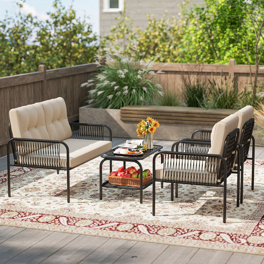 4 Pieces Patio Furniture Set PE Rattan Sofa Chairs with Loveseat-Beige in a garden setting with cushions and coffee table