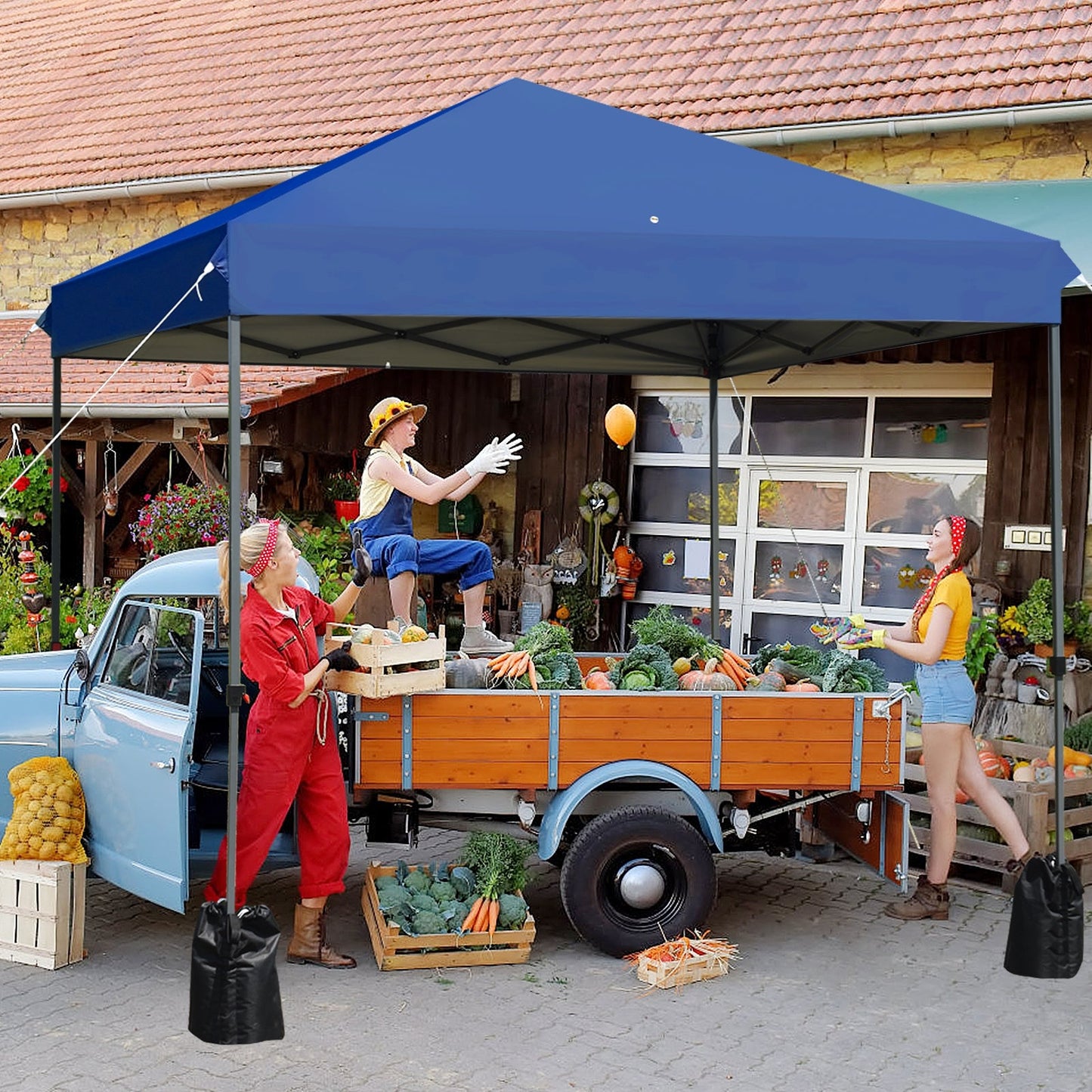 8x8 Pop Up Canopy Tent w/Roller Bag-Blue providing shade at a market stall with vegetables and people unloading truck