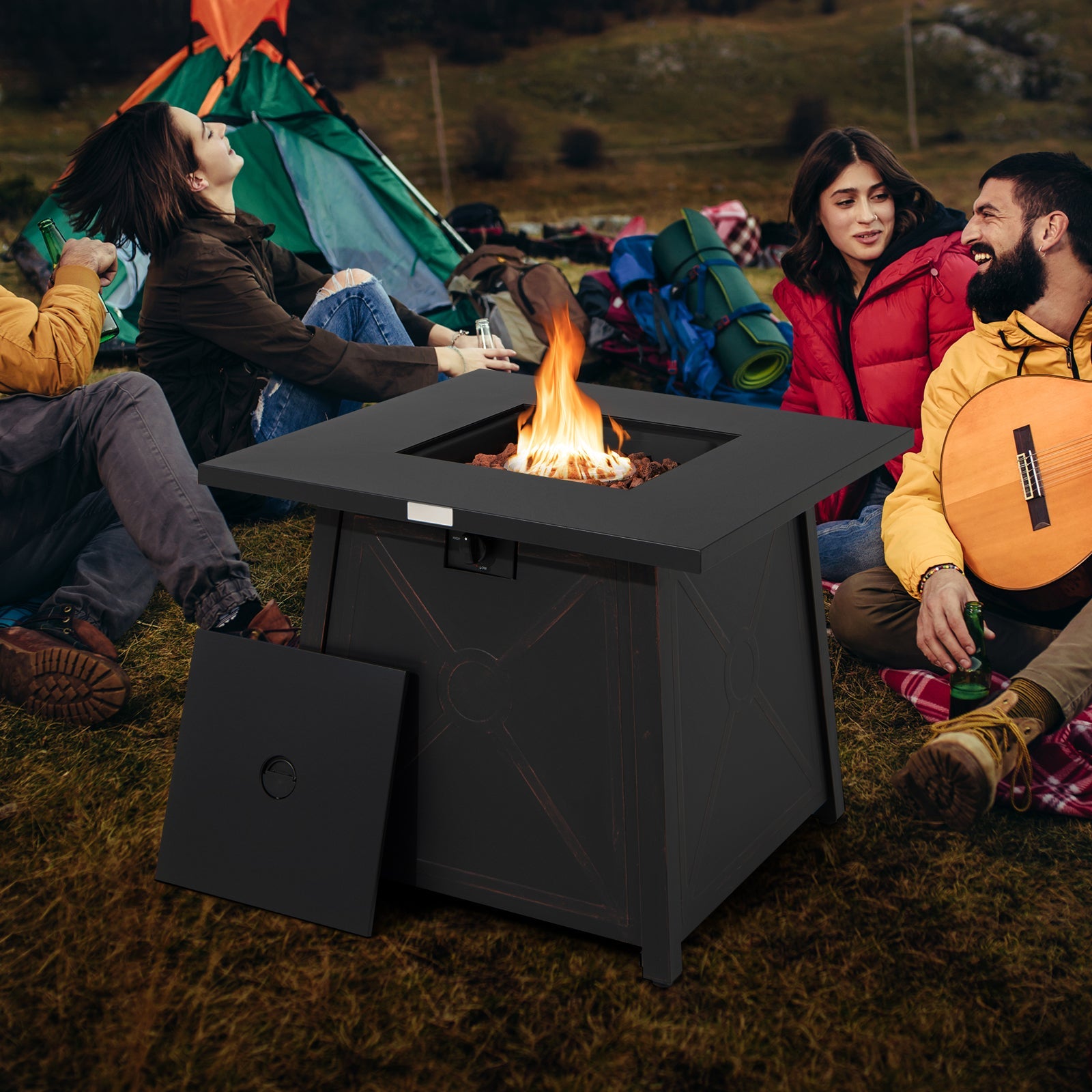 30 Inch Square Propane Gas Fire Table with Waterproof Cover used outdoors by group of people camping at night.