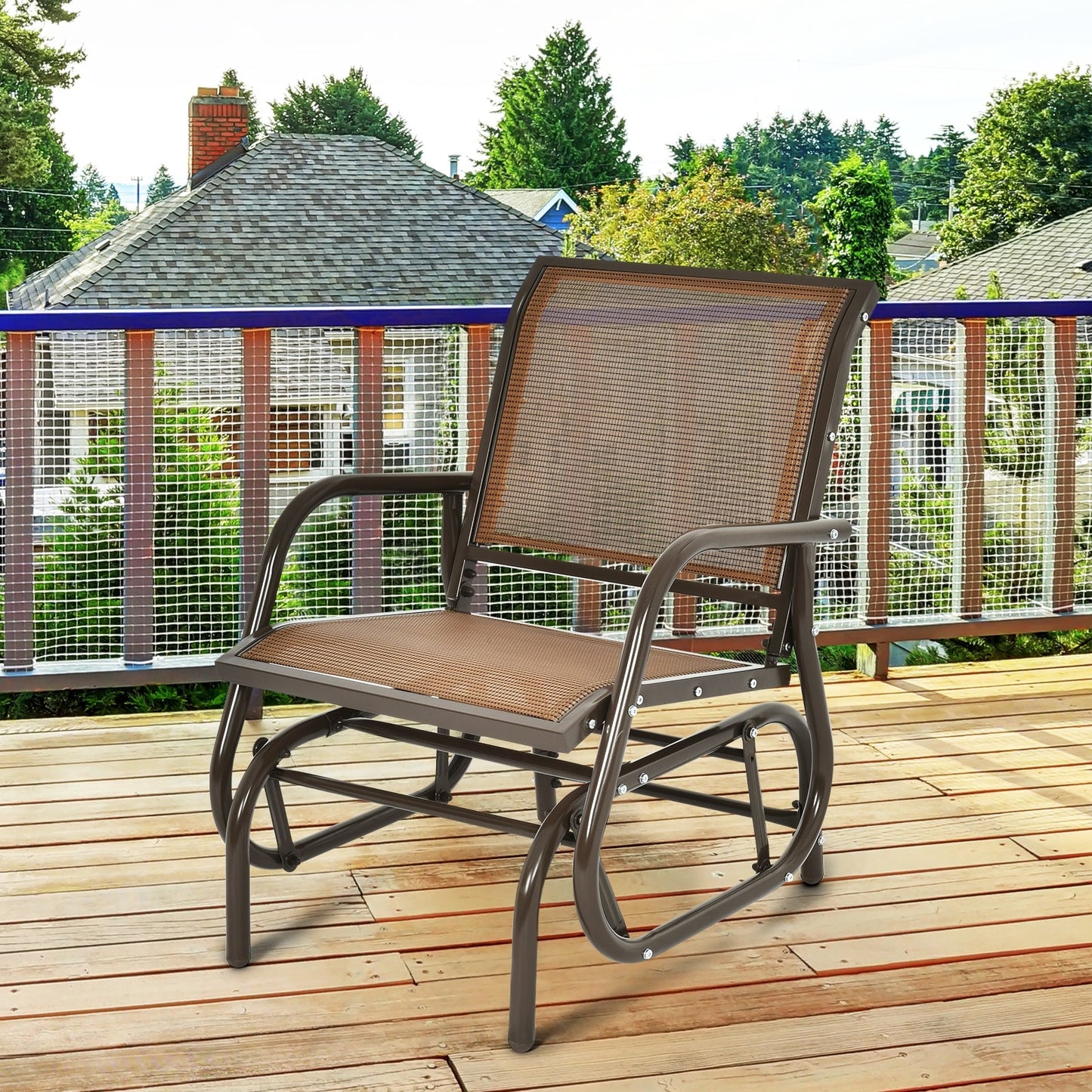 Outdoor Single Swing Glider Rocking Chair with Armrest-Brown on a patio deck, featuring sturdy steel frame and comfortable armrests.