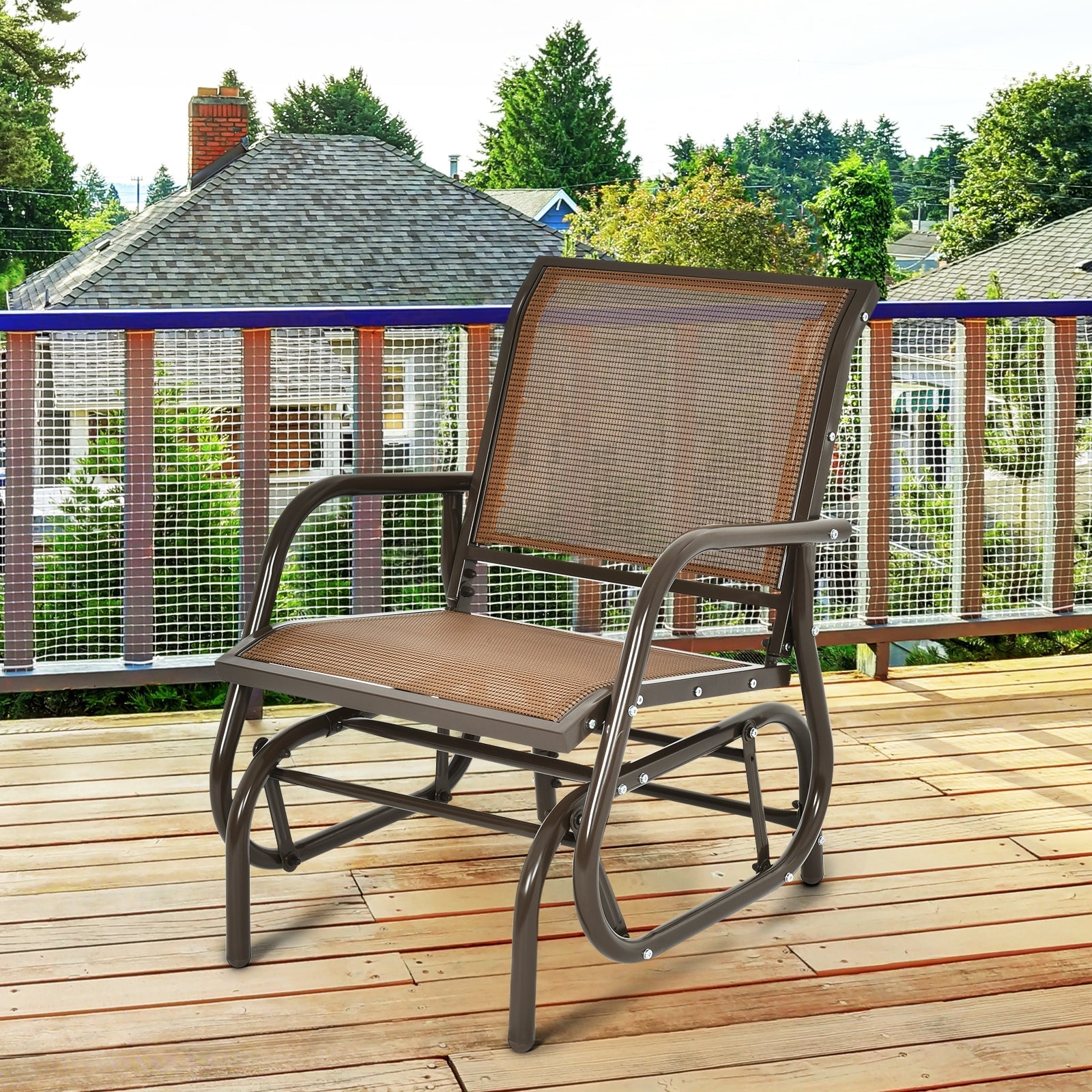 Outdoor Single Swing Glider Rocking Chair with Armrest-Brown on a patio deck, featuring sturdy steel frame and comfortable armrests.