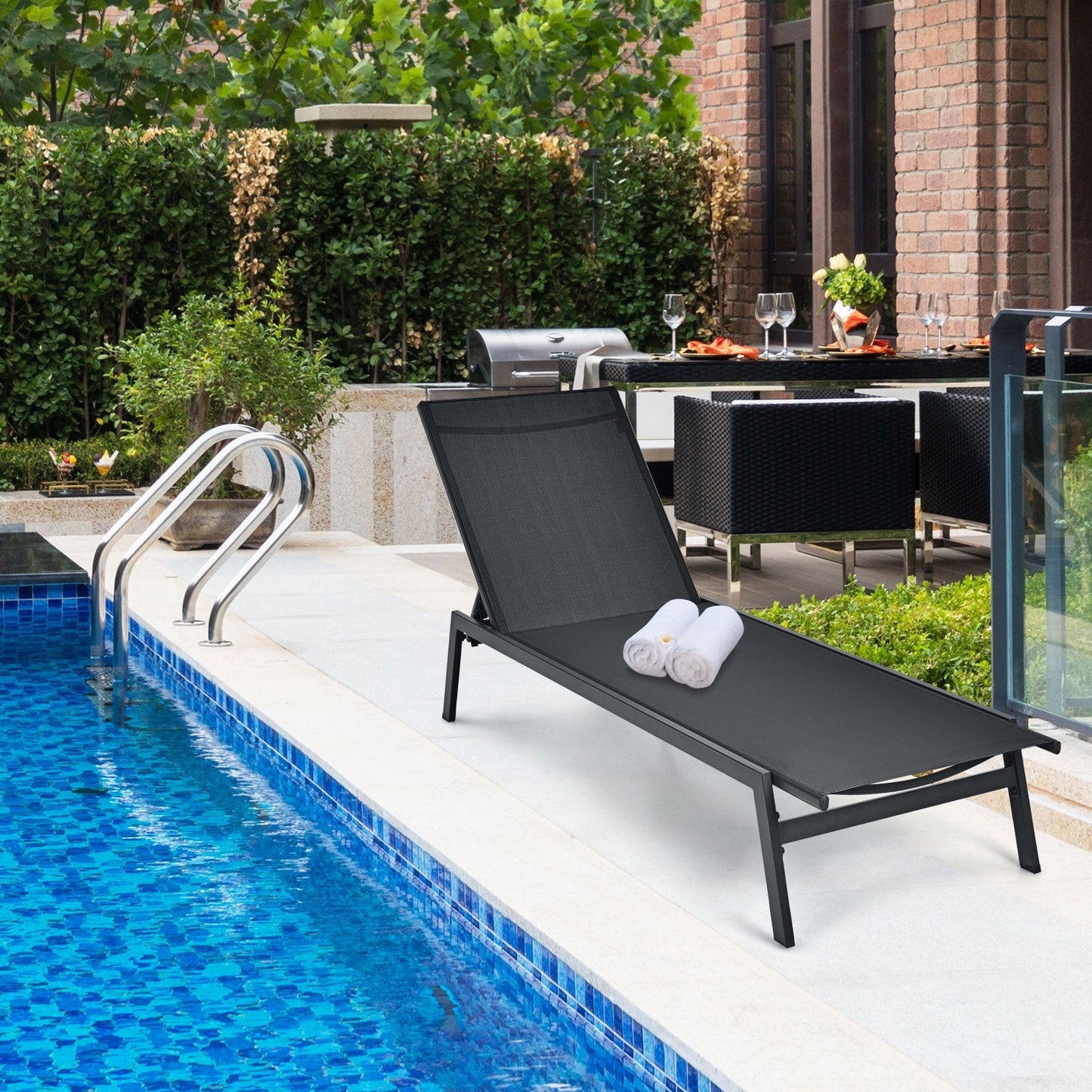 Outdoor Reclining Chaise Lounge Chair with 6-Position Adjustable Back-Black by the poolside.