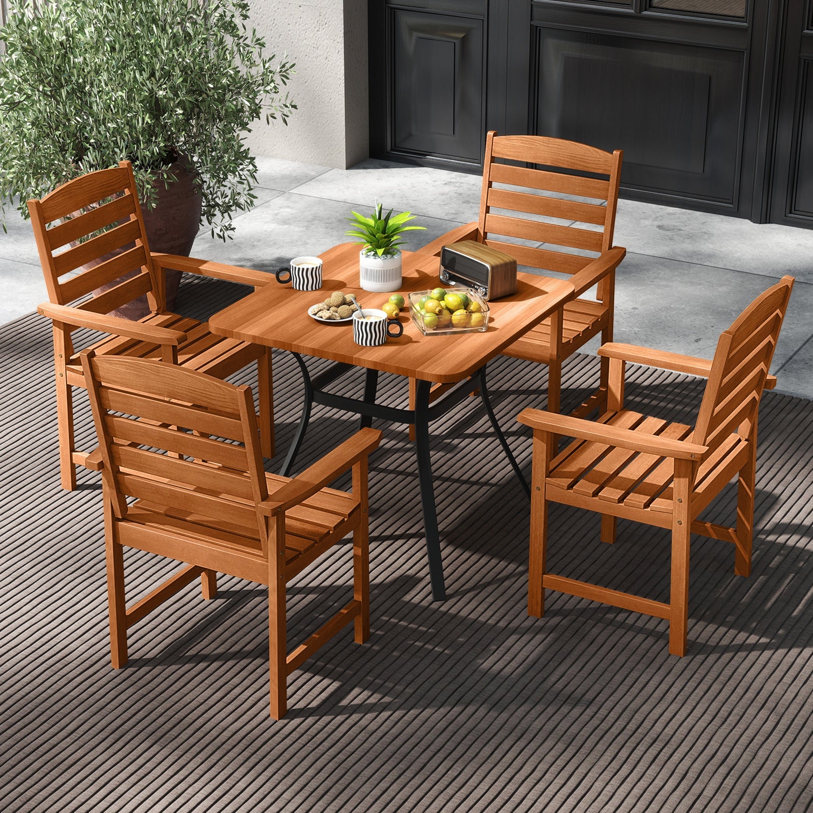 Outdoor Wooden Dining Chairs with Inclined Backrests and Slatted Seats around a dining table on a patio