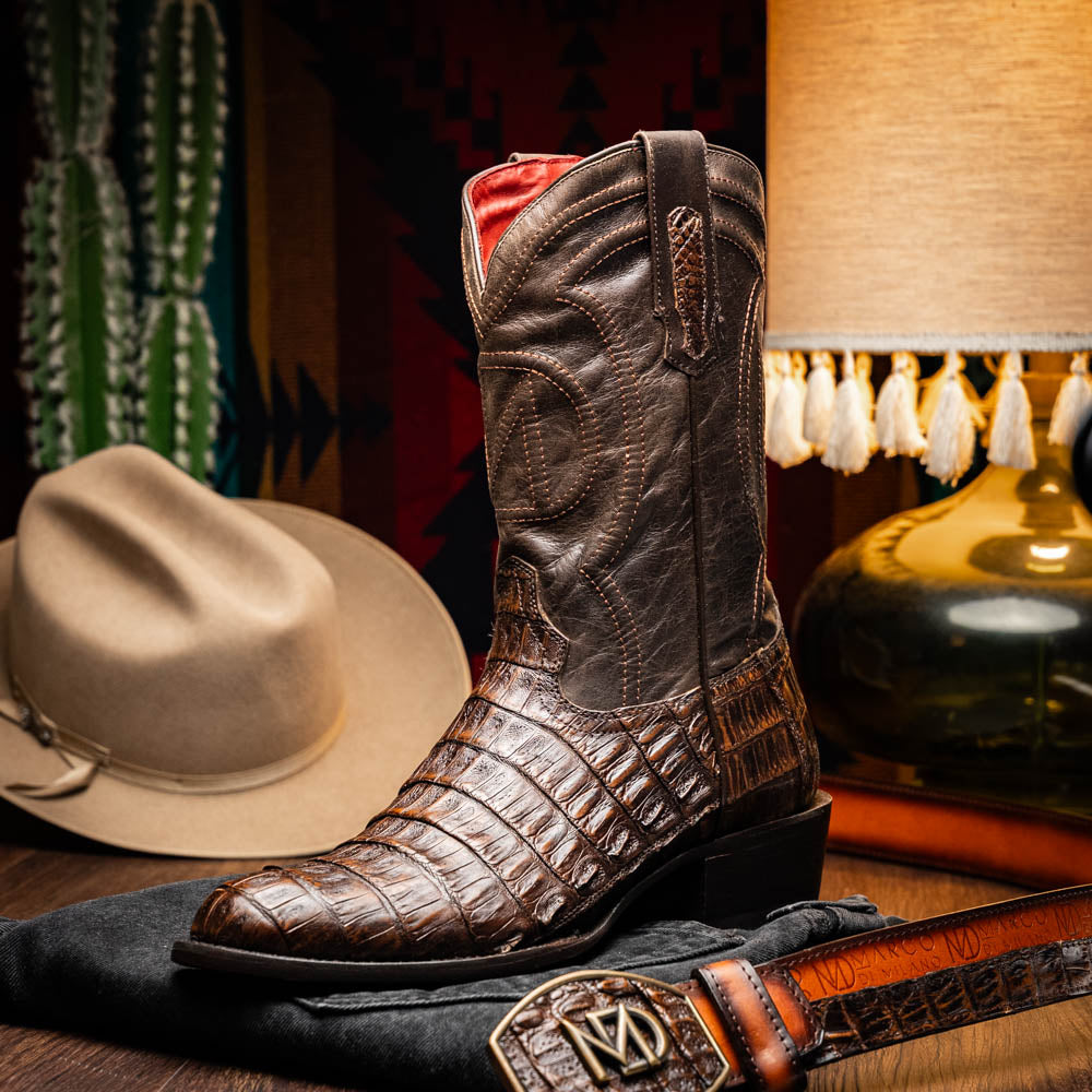 Phoenix Aged Brown cowboy boot made from genuine caiman belly skin, showcasing Western style with a smooth texture and round toe finish.