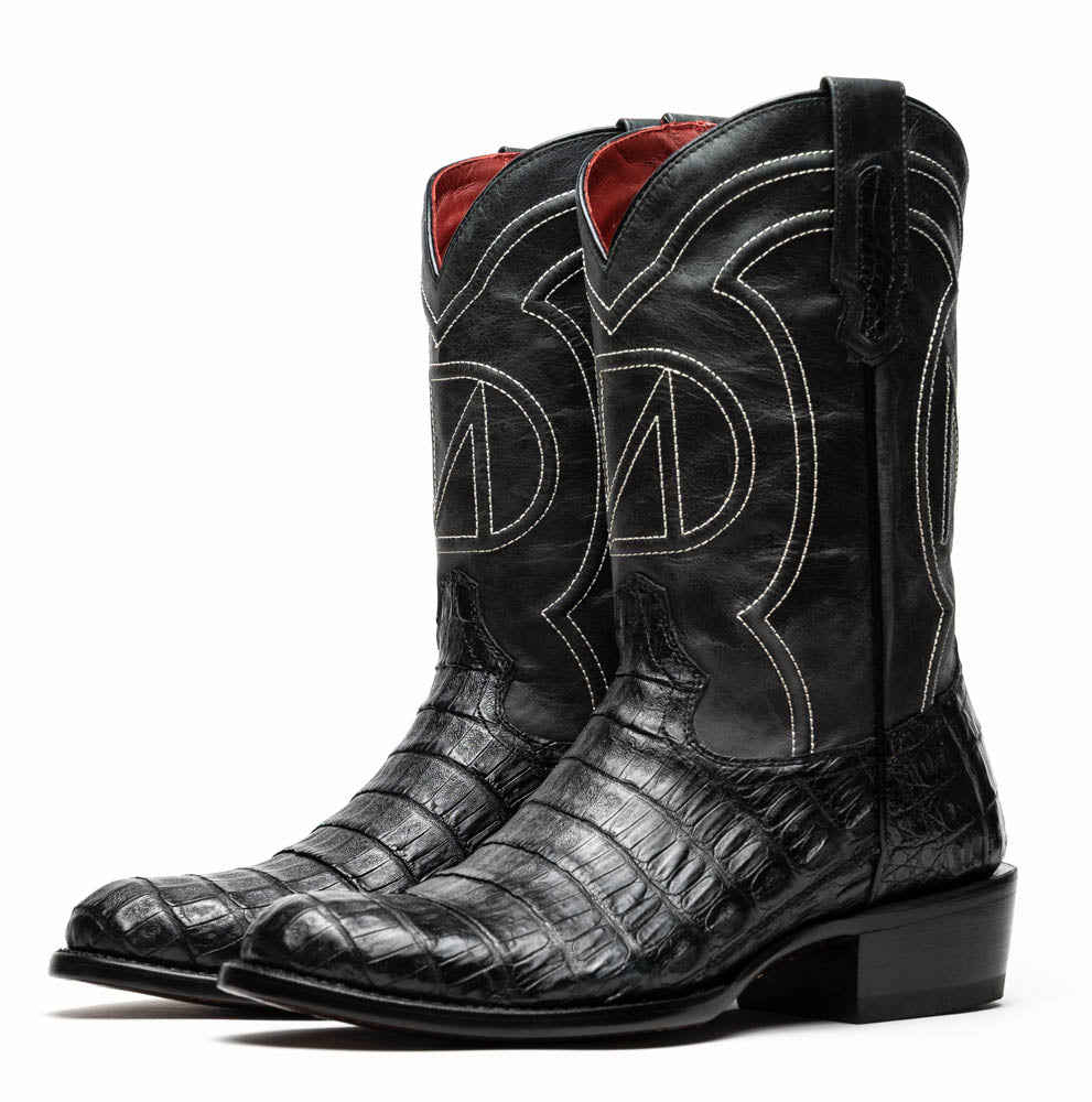 Phoenix Black cowboy boots with caiman belly skin and detailed design, capturing Western style and elegance.