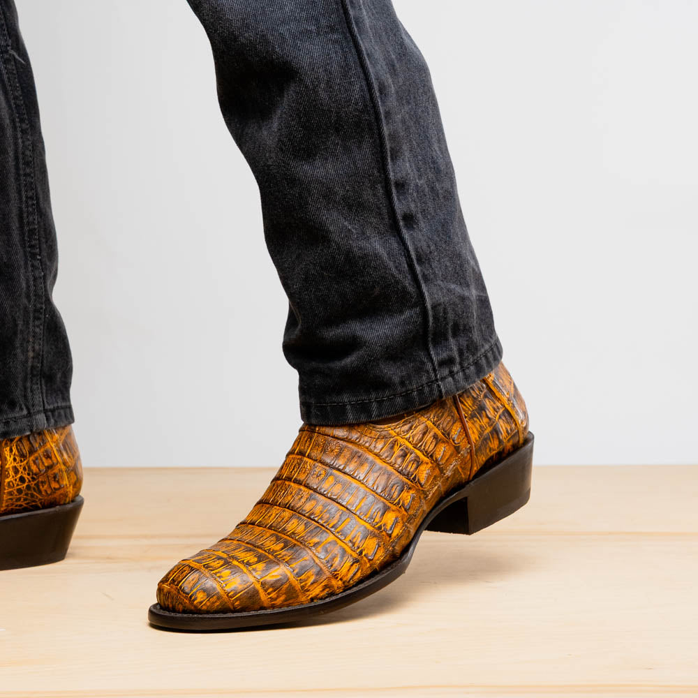 Phoenix Mustard Brown caiman belly skin cowboy boots with full-grain leather shaft showcasing Western style and smooth texture.