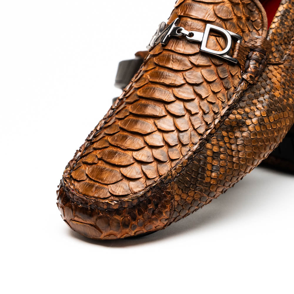 Close-up of Pia Cognac driver shoe made from genuine python skin, showcasing bold textures and luxury craftsmanship for men.