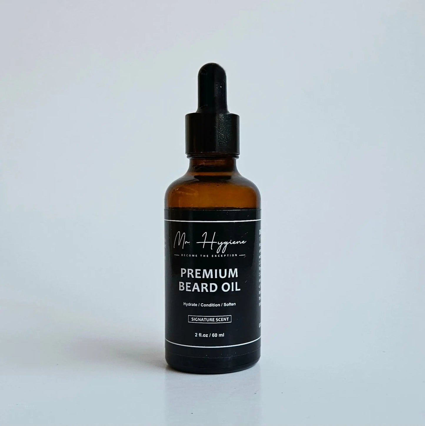 Bottle of Premium Beard Oil, designed to nourish and hydrate, with signature scent for the modern man.