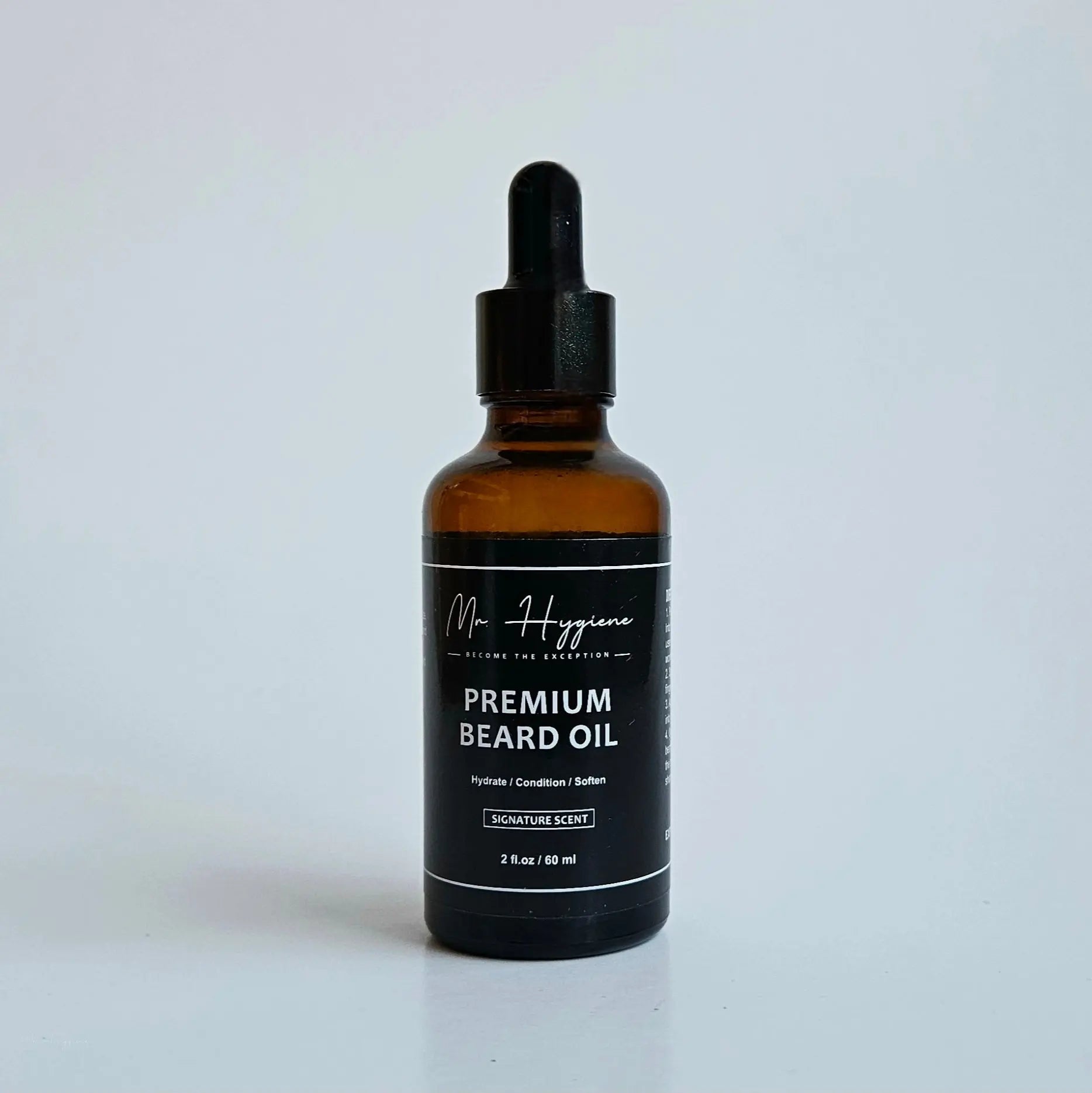 Bottle of Premium Beard Oil, designed to nourish and hydrate, with signature scent for the modern man.