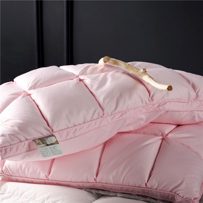 Giancarlo Goose Down Filling Pillows Set of 2, soft pink pillows on a bed with smooth texture and 100% goose down filling.