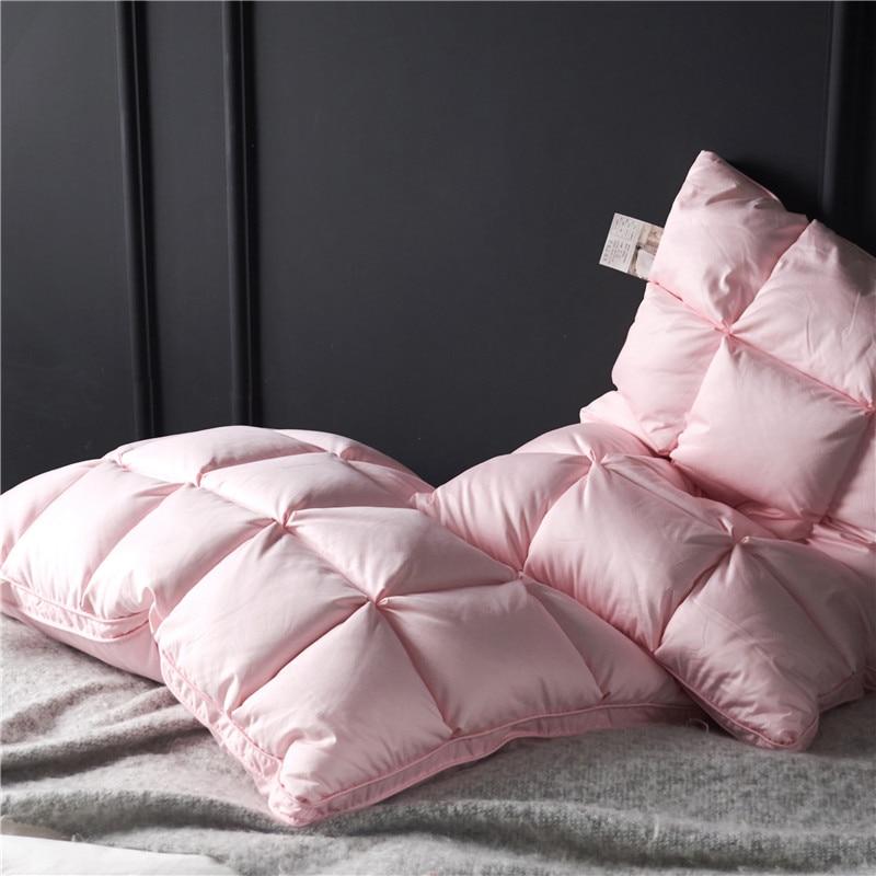 Giancarlo Goose Down Filling Pillows Set of 2 shown in soft pink on a bed