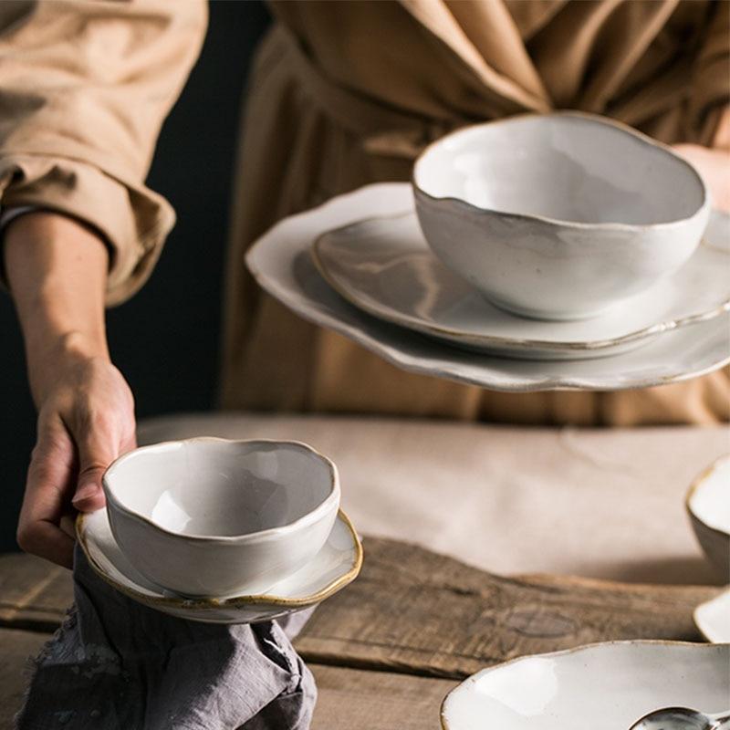 Thetis Tableware Set featuring ceramic bowls and plates with vibrant glazes, ideal for stylish dining and easy storage.